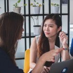 Two women talking