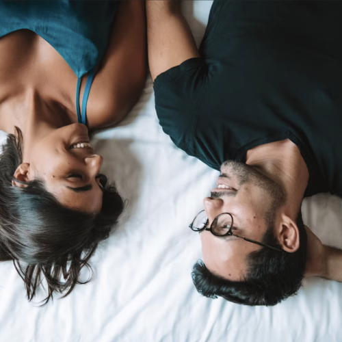 a couple laying in bed