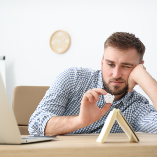 Man procrastinating